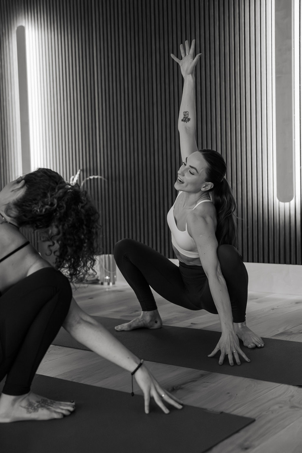 Helen practising yoga in a sunlit terracotta studio